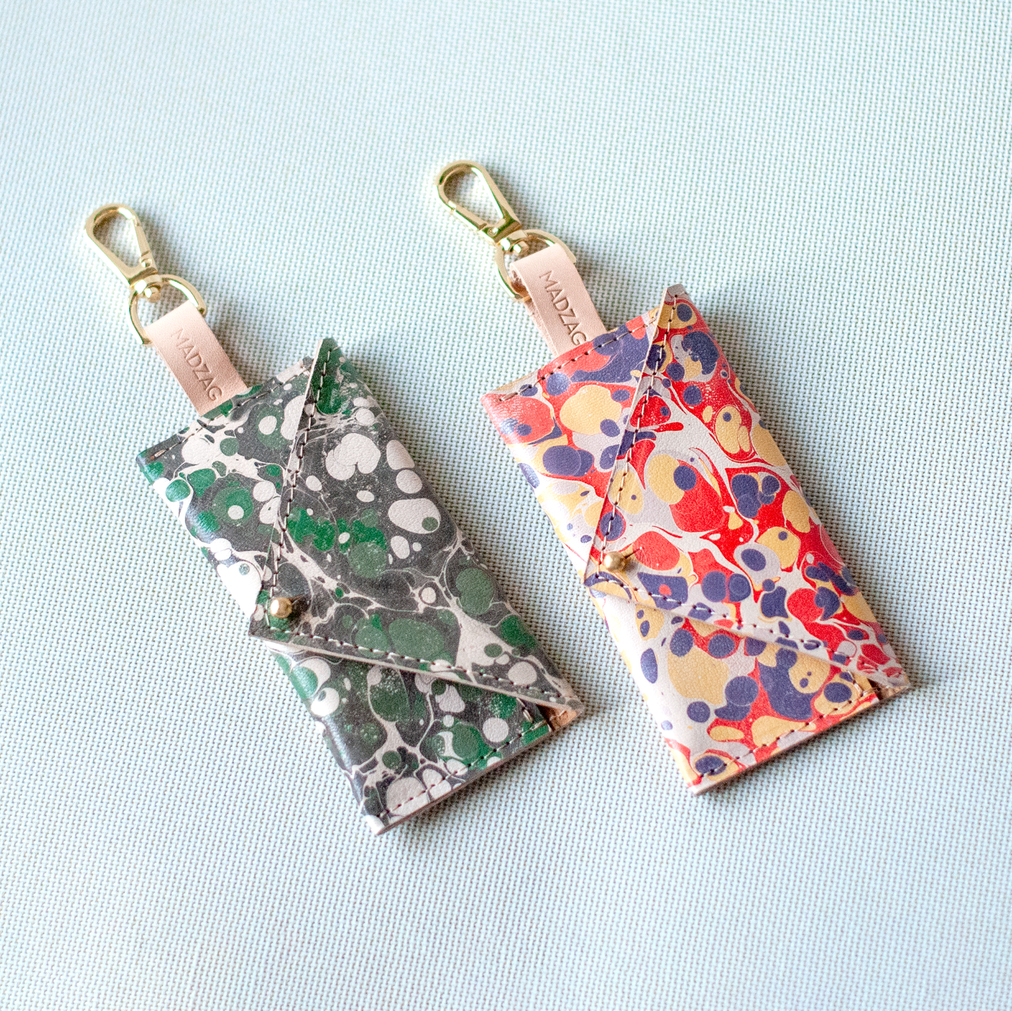 Márványos Zacskótartó